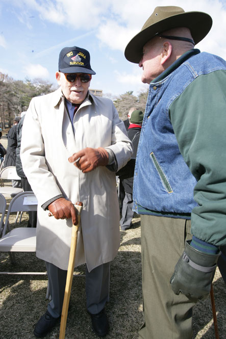 Longstanding National Park Service volunteer Larry Ward (right) greeted retired Maj Norman T. Hatch after the ceremony. 