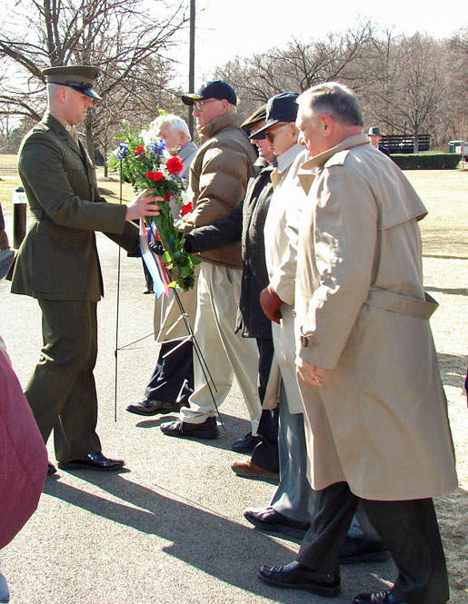 Members of the United States Marine Corps Flag Detail, Inc., also known as “Iwo Flags, approached the memorial to lay a wreath in memory of those who gave their life during the Battle of Iwo Jima in 1945. Representative of Iwo Flags who were present that day include James P. Donovan, John Boes, Col John B. Donovan, USMC (Ret), Richard Doyle, Maj Norman T. Hatch, USMC (Ret) and Joseph Westner.
